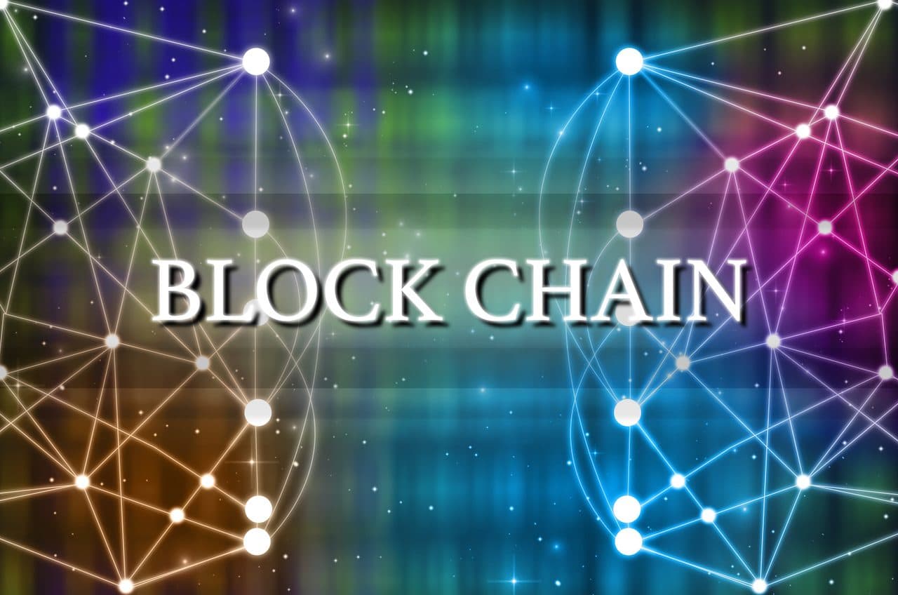 The word Blockchain over glowing network nodes linked by lines on a multicoloured background